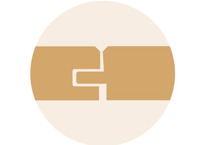 En beige och brun cirkel med ett geometriskt mönster som påminner om ett pussel i mitten.
