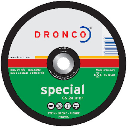 Rund kapskiva med text "DRONCO special CS 24 R-BF", färgband, och specifikationer.