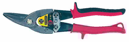 Plåtsax med röda handtag och metallskär, etikett med text på den övre delen.