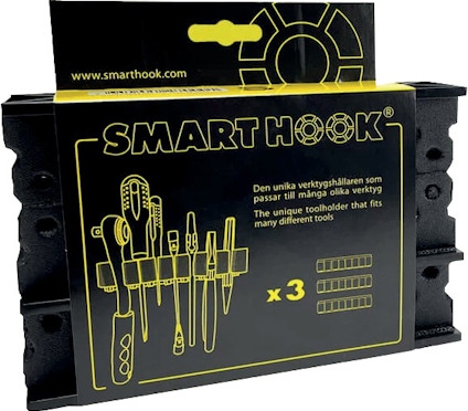 Förpackning med svart SmartHook verktygshållare, illustration av verktyg och text på svenska och engelska.